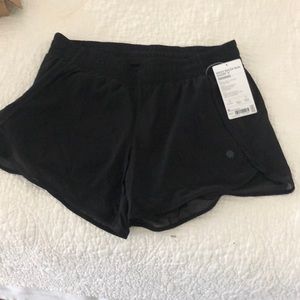 Athleta Mercer racing shorts